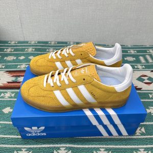 Adidas Yellow Suede Low Top Sneakers