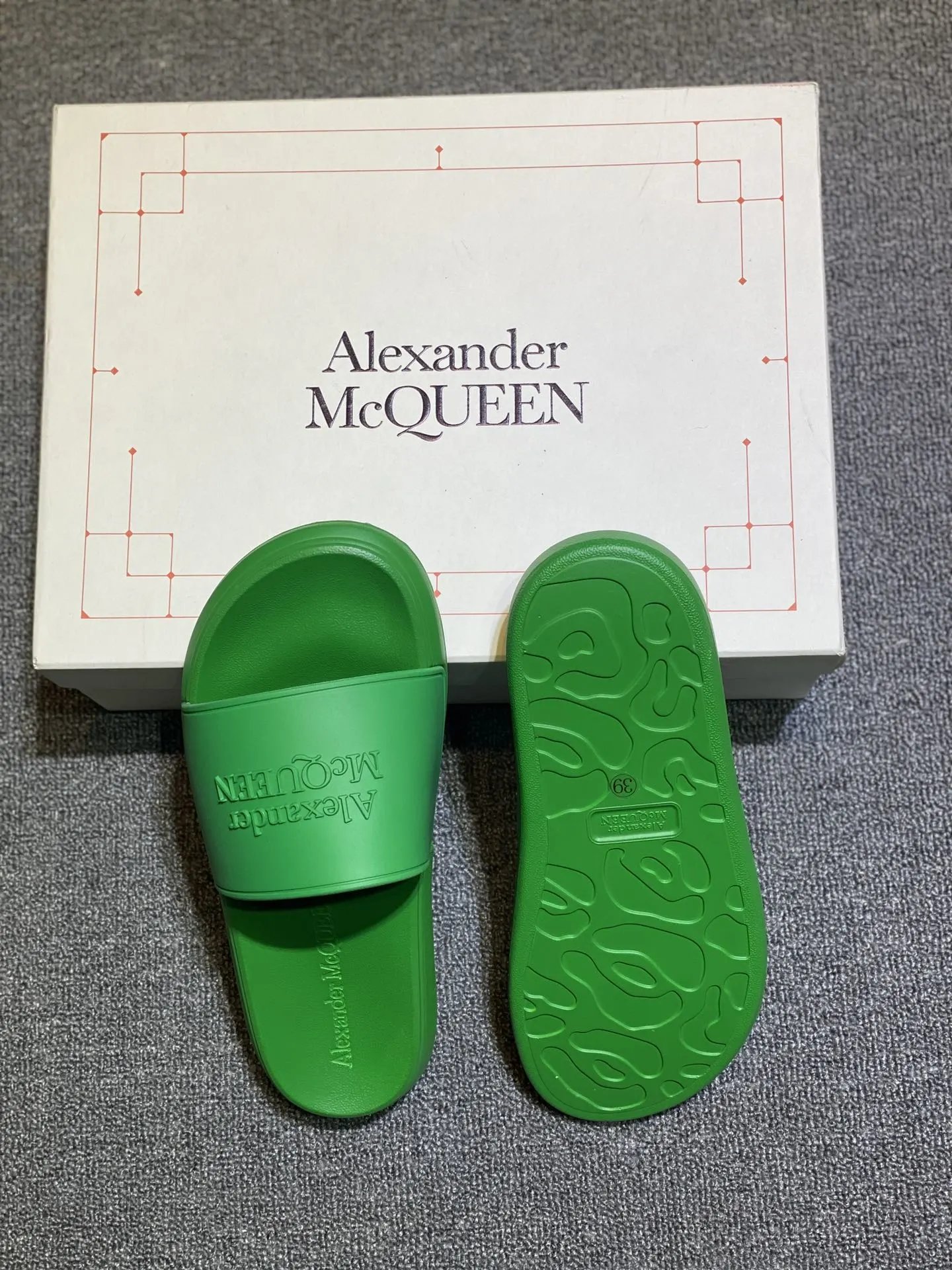 Alexander McQueen Green Logo Embossed Rubber Slide Sandals - Buy at OopBuy