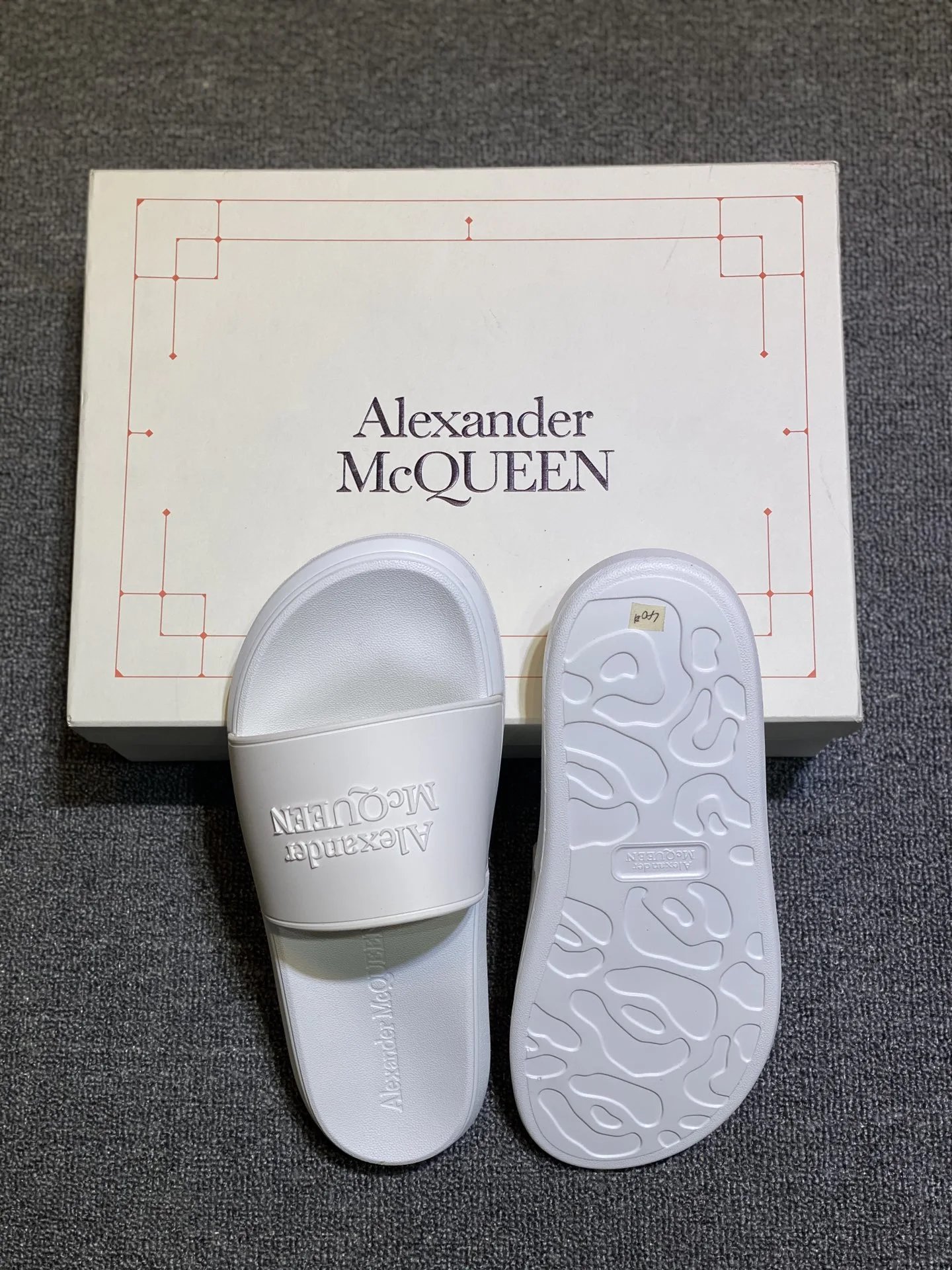 Alexander McQueen White Logo Embossed Pool Slide Sandals - Buy at OopBuy